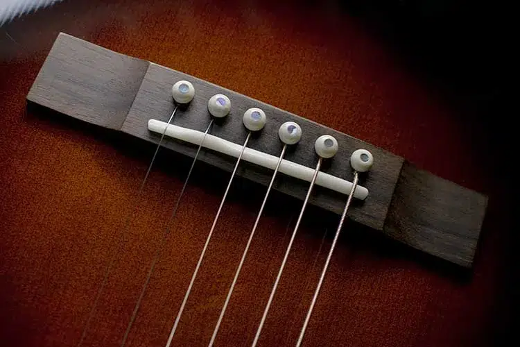 Do Bridge Pins Really Affect Your Guitar’s Sound? The Truth Revealed!