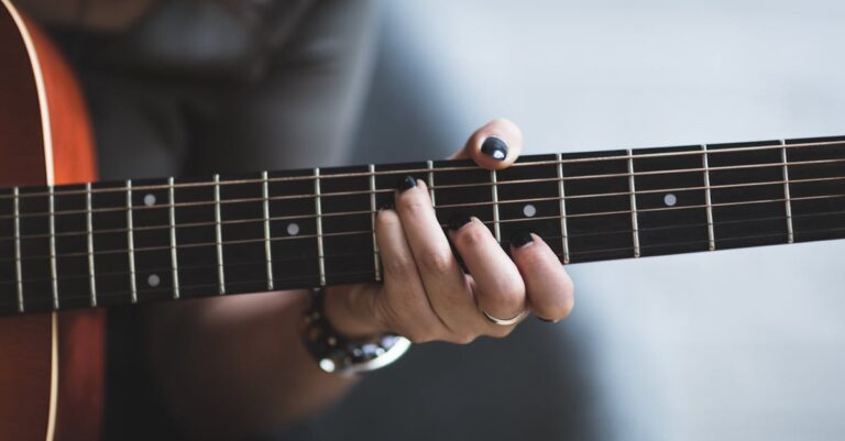 Can You Play Guitar With Long Nails? The Hidden Limits & Crazy Advantages!