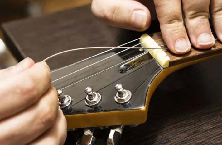 How Often Should You Change Guitar Strings? Extend Their Life!