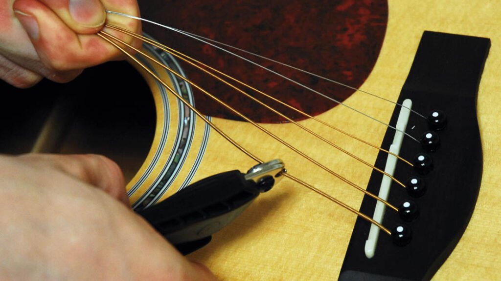 How to Remove Acoustic Guitar Bridge Pins – Quick, Easy Guide!